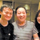 Wang (center) with Jack Ma (left) and actress Zhao We.